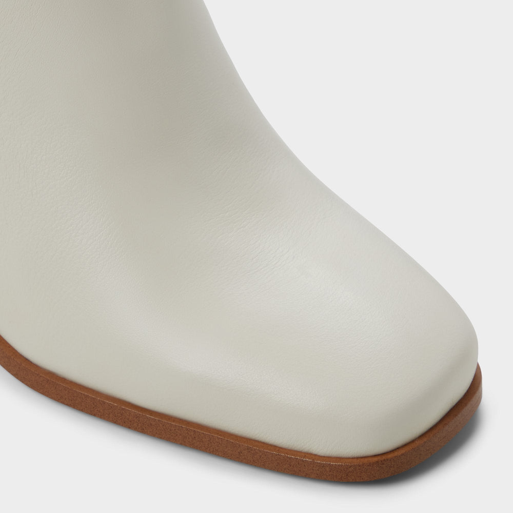 Block heel Elyze in White Bone - Knee-high boot
