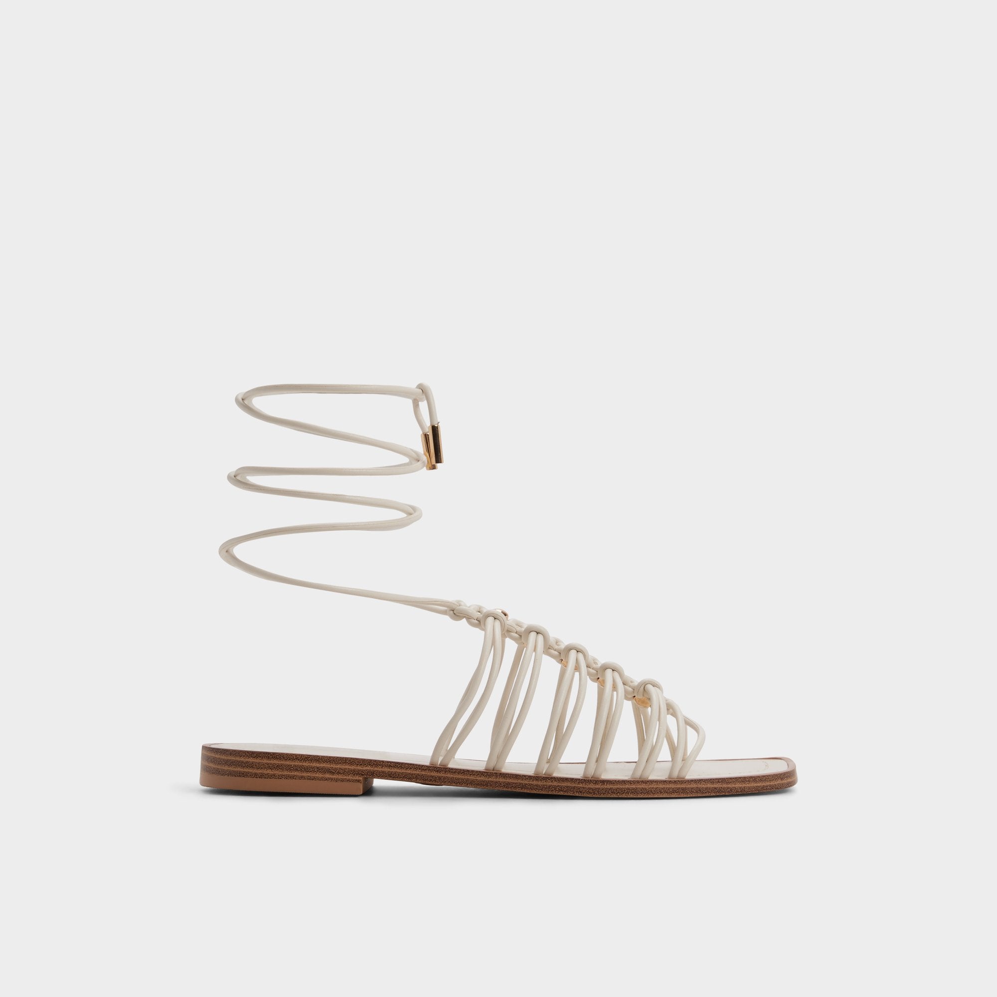 Unoma in White Bone - Strappy flat sandal