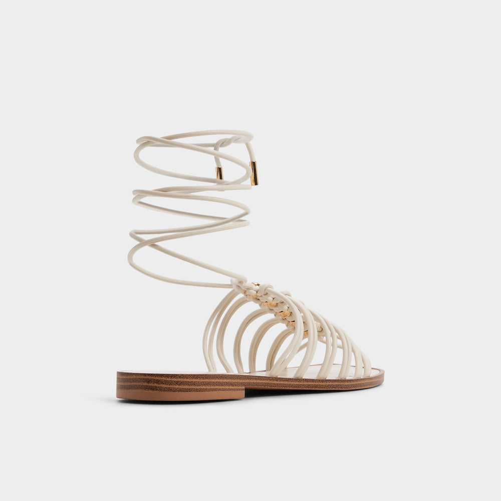 Unoma in White Bone - Strappy flat sandal