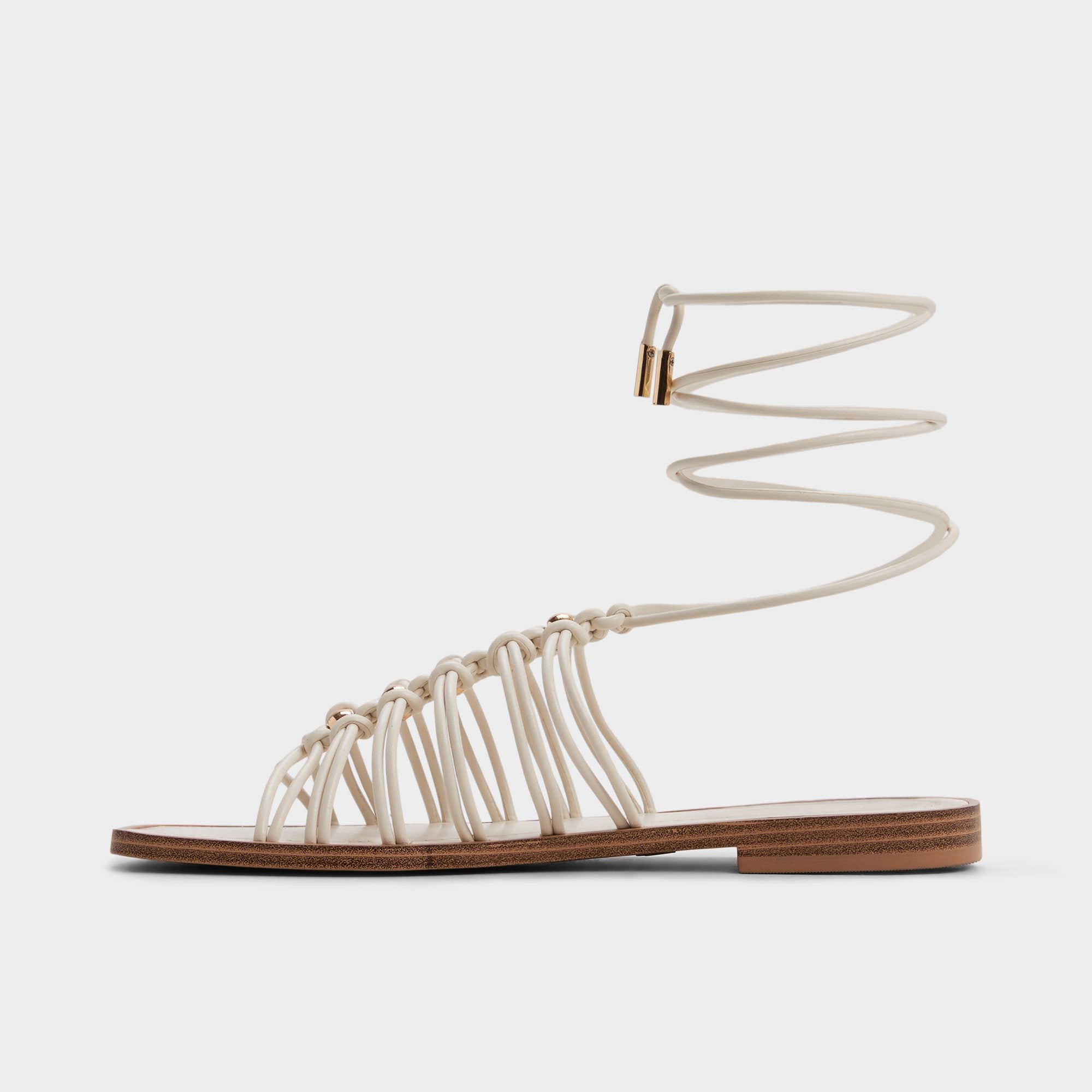 Unoma in White Bone - Strappy flat sandal