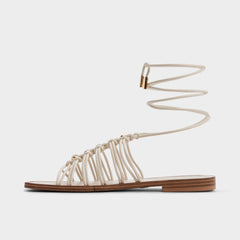 Unoma in White Bone - Strappy flat sandal
